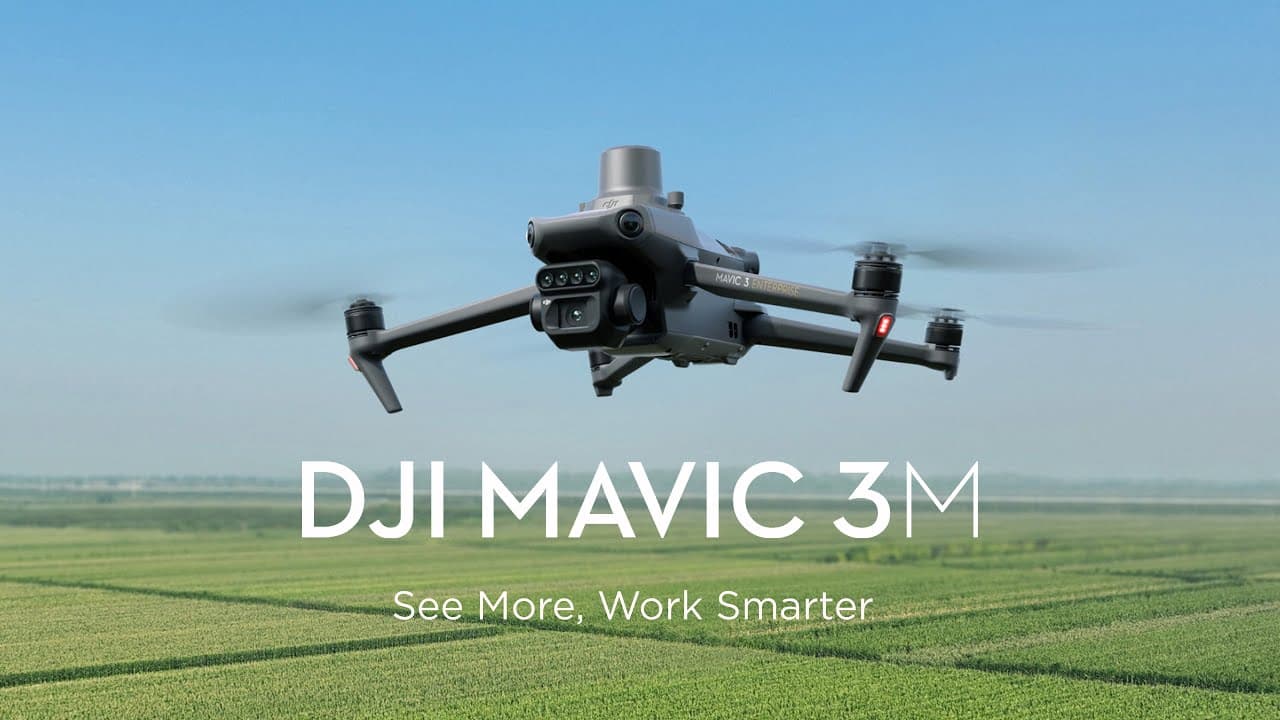 DJI Mavic 3M drone hovering over a green field with text See More, Work Smarter.